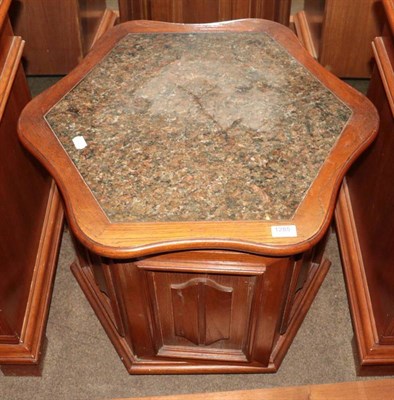 Lot 1285 - A Chinese hardwood centre table, with marble top and cupboard door