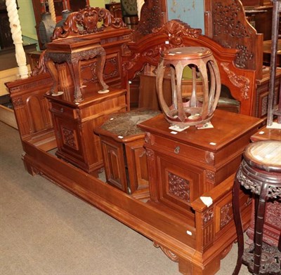 Lot 1286 - A 20th century Chinese hardwood bed, 194cm wide