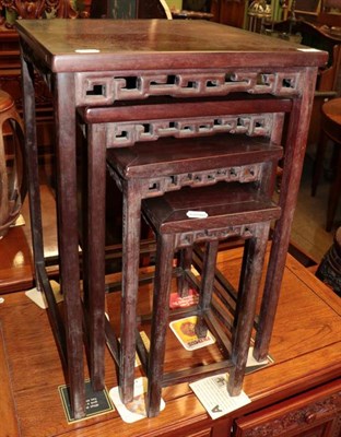 Lot 1290 - A nest of four Chinese hardwood nesting tables (20th century)