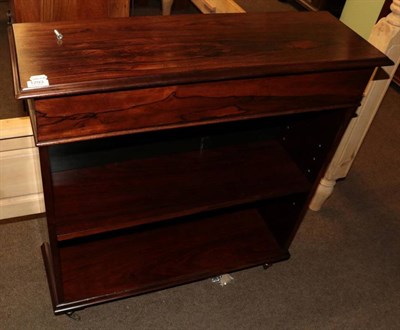 Lot 1293 - A rosewood two tier open bookcase, 88cm by 29cm by 94cm