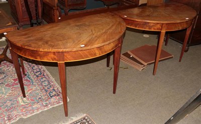 Lot 1295 - A pair of George III mahogany D end side tables