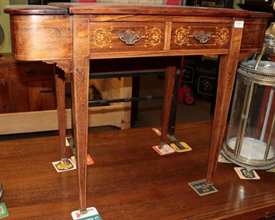 Lot 1301 - An Edwardian rosewood and satinwood marquetry inlaid writing table, leather inset, twin drawers and