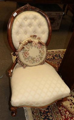 Lot 1317 - A Victorian lady's walnut framed, buttoned, spoon back chair