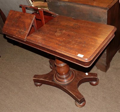 Lot 1321 - A Victorian mahogany reading table