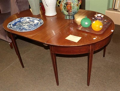 Lot 1323 - A George III mahogany and boxwood strung D-end dining table, with single leaf, square tapered legs