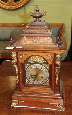 Lot 1326 - A walnut quarter striking mantel clock