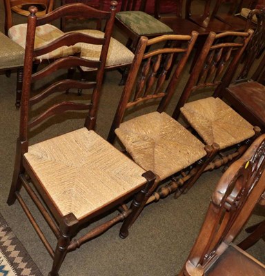 Lot 1333 - A pair of 19th century ash spindle back and rush seated dining chairs and a single ladder back...