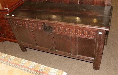 Lot 1353 - A late 17th century joined oak chest with hinged lid and nulled frieze