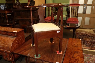 Lot 1357 - A George II walnut corner chair