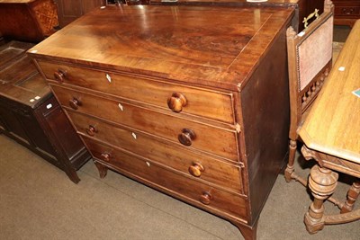 Lot 1364 - A late George III mahogany four drawer straight fronted chest on bracket feet