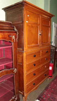 Lot 1376 - A late George III pine press cupboard