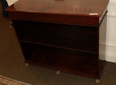 Lot 1393 - A mahogany two tier open bookcase with paw shaped feet, 102cm by 32cm by 82cm