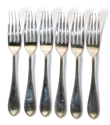 Lot 181 - A set of six silver table forks, Walker & Hall, Sheffield 1930, with a zigzag border, 10.5ozt