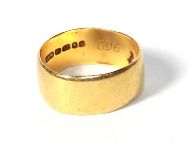 Lot 185 - A 22 carat gold band ring (out of shape)