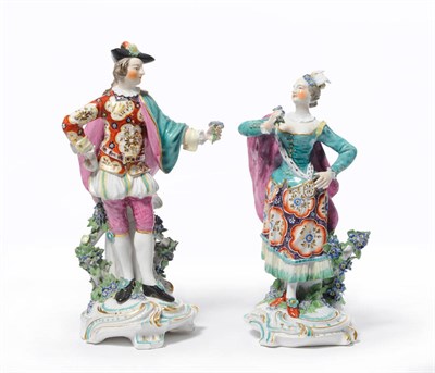 Lot 180 - A Pair of Derby Ranelagh Dancers, circa 1765, each figure holding a posy of flowers and picked...