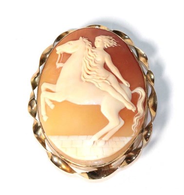 Lot 188 - A cameo brooch, in a frame stamped '9CT', measures 5.5cm by 7cm
