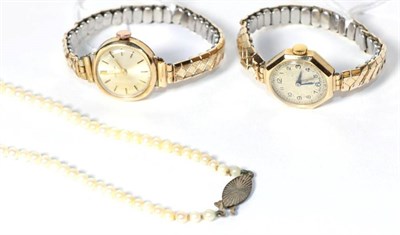 Lot 190 - Two lady's gold cased wristwatches; and a single strand of cultured pearls with silver snap, length