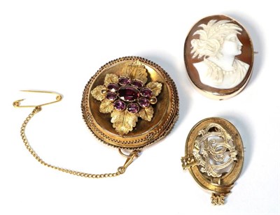 Lot 198 - A shell cameo, in a frame stamped '9C'; a Victorian gilt metal brooch with cursive initials...