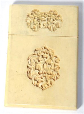 Lot 201 - A Chinese export carved ivory card case, late 19th century, sunken relief panels, 11cm height
