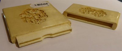 Lot 201 - A Chinese export carved ivory card case, late 19th century, sunken relief panels, 11cm height