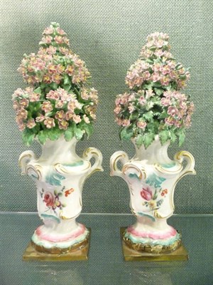 Lot 183 - A Pair of Chelsea/Derby Flower Urns, circa 1775, each rococo scroll moulded urn painted with...