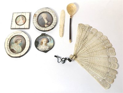 Lot 229 - Four 1920's miniature portraits of ladies; a bone paper knife; a marine ivory spoon; and a bone...