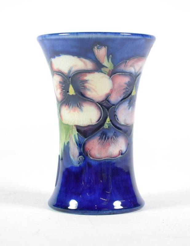 Lot 233 - A William Moorcroft pottery Pansy pattern vase with painted and impressed marks, 11cm high