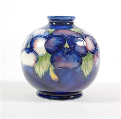 Lot 234 - A William Moorcroft pottery Pansy pattern vase of spherical/bulbous shape with painted and...