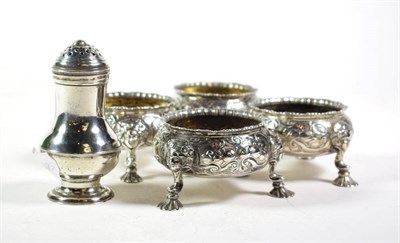 Lot 237 - A set of four George III silver salts, David Hennell, London 1745, with mask and shell feet,...