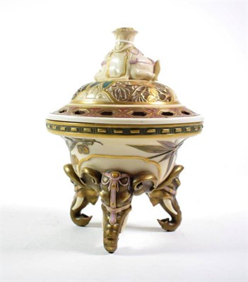Lot 246 - A Royal Worcester pot pourri bowl and cover, on elephant supports
