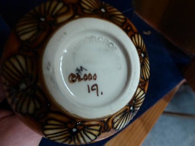 Lot 256 - A Moorcroft pottery ''The Siblings'' pattern vase designed by Vicky Lovatt of cygnets amongst...