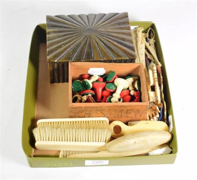 Lot 260 - A 19th century bovine horn box; late 19th century ivory and bone oddments; and a bone chess set
