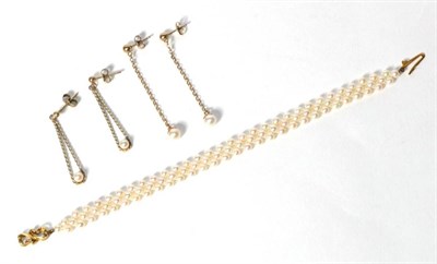 Lot 263 - An 18 carat gold clasped three row cultured pearl bracelet, length 18cm; and two pairs of drop...