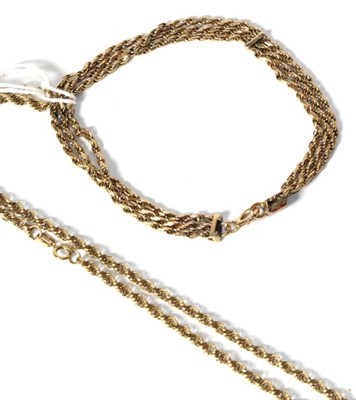 Lot 264 - A 9 carat gold rope twist necklace, length 46.5cm; and a three row bracelet, stamped '9KT'...