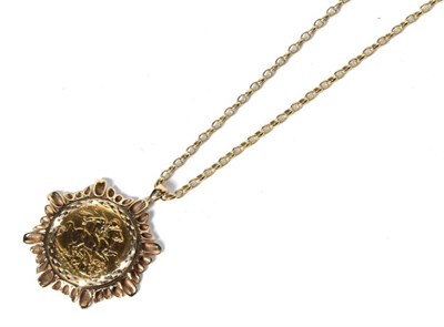 Lot 267 - A 1920 sovereign loose mounted as a pendant, on a 9 carat gold belcher chain, chain length 51.5cm