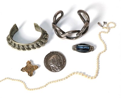 Lot 273 - A Celtic style cross, two white metal bangles, cultured pearls, brooch and medallion (6)
