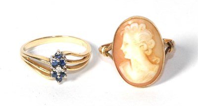 Lot 279 - A sapphire ring stamped '14K', finger size M; and a shell cameo ring stamped '750', finger size...
