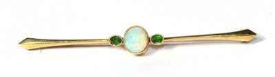 Lot 285 - An opal and peridot bar brooch, stamped '15CT'