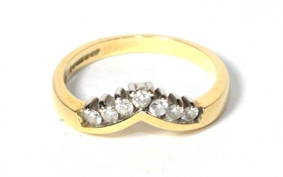 Lot 296 - An 18 carat gold diamond wishbone ring, finger size M