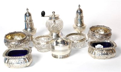 Lot 304 - A pair of Victorian silver pepperettes; a pepper grinder; three pairs of salts and another (10)