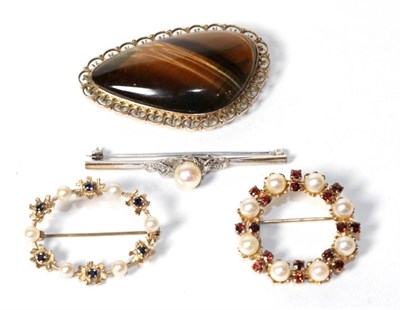 Lot 305 - A cultured pearl bar brooch, stamped '9C', length 5cm; a cultured and gemset circular brooch,...