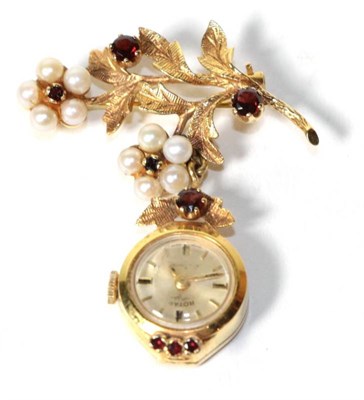 Lot 312 - A 9 carat gold and gem set Rotary pendant watch