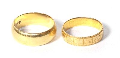Lot 334 - An 18 carat gold patterned band ring, finger size P; and an 18 carat gold band ring, finger...
