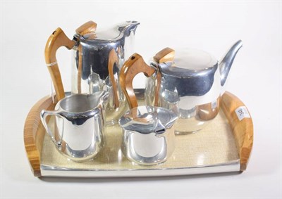 Lot 348 - A 1950s picquot ware five piece chromed service with tray