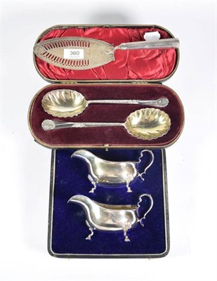 Lot 360 - A pair of silver sauce boats, Adie Bros, Birmingham 1923, in a fitted case; a George III silver...