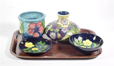 Lot 373 - Moorcroft Pottery comprising Hibiscus vase, Borage vase and a further small bowl and coaster (4)