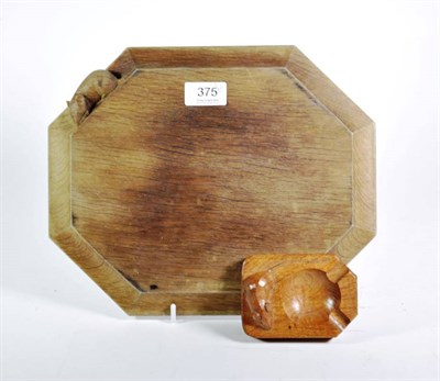 Lot 375 - Robert 'Mouseman' Thompson of Kilburn: an English oak breadboard and and ashtray, each with...