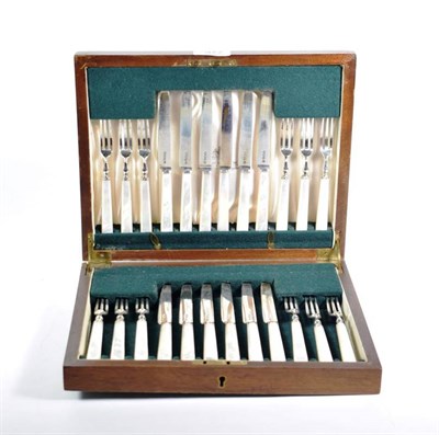 Lot 377 - Twelve pairs of Art Deco silver fruit knives and forks, John Sanderson & Son, Sheffield 1947,...