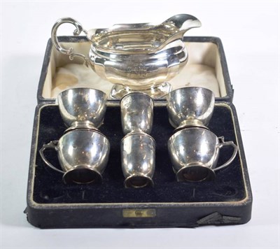 Lot 378 - A six piece silver condiment set, Goldsmiths & Silversmiths, London 1950, in a Garrard fitted...
