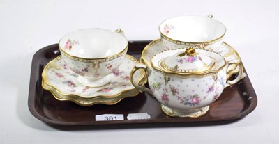 Lot 381 - Royal Crown Derby 'Royal Antoinette' pattern teawares comprising two trios and a twin-handled...